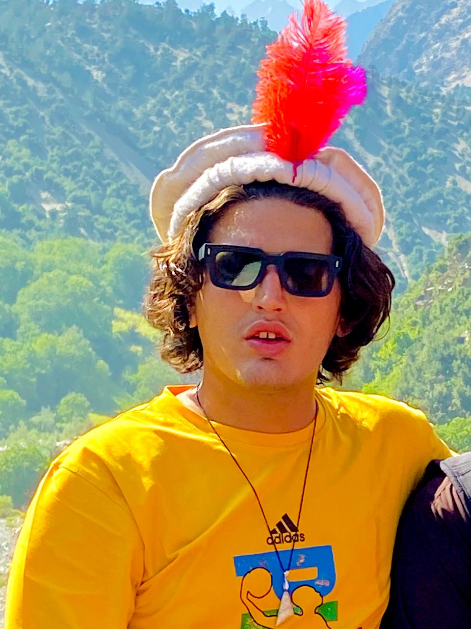 Local Kalash guide with travelers