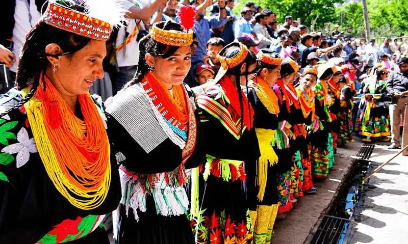 Local Kalash guide walking with guests